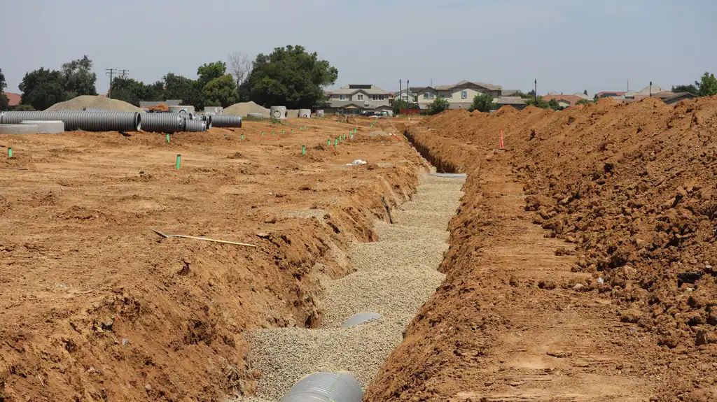 Drainage trenches dug for new pipework, gully installation by The Drain Masters Swindon